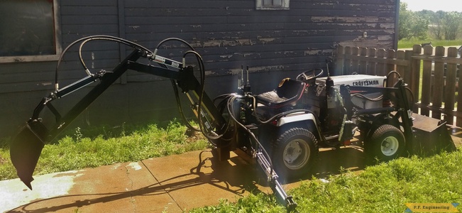 Sears Craftsman loader and micro hoe by Dennis Burnavik, Cedar, MN