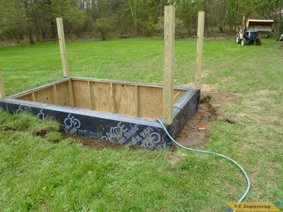 backfilling the outside with dirt. palram 6 x 10 greenhouse project