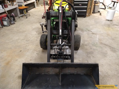 Richard W. from Winchester ID and his JD 140 with pin on mini payloader front view