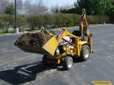 cub 149 carrying gravel