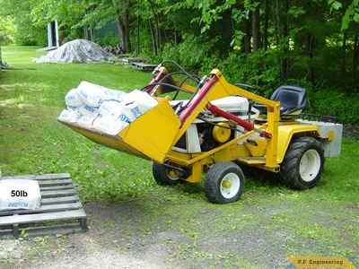 loader lifting 450lb lime